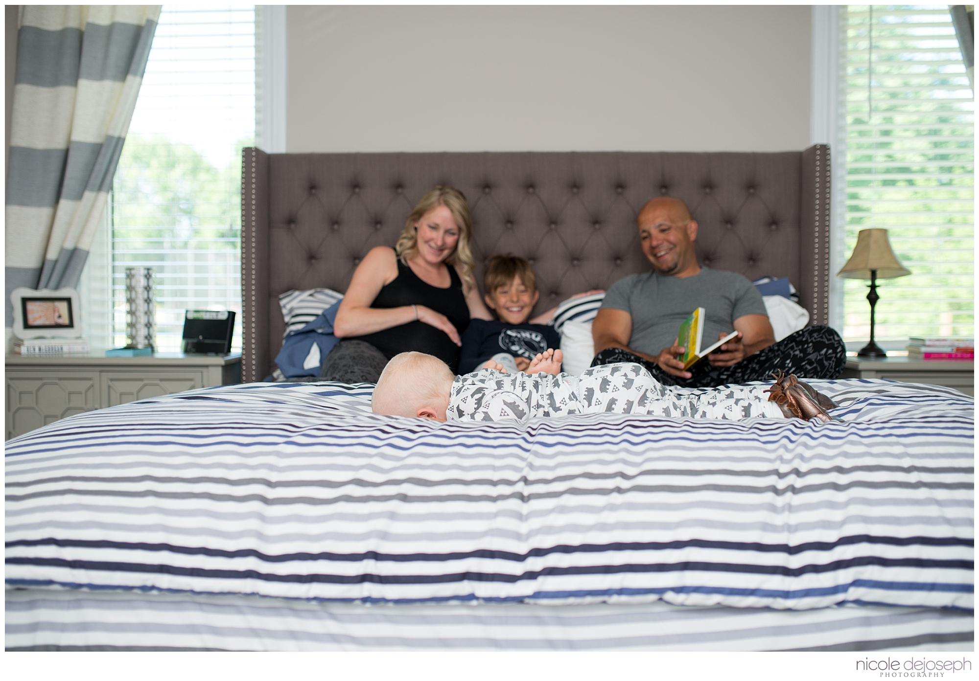 Britanie and Grayson's quiet days together before the new babe arrives. In home lifestyle maternity photographer. Nicole DeJoseph Photography; Chatham, Ontario wedding and lifestyle photographer.