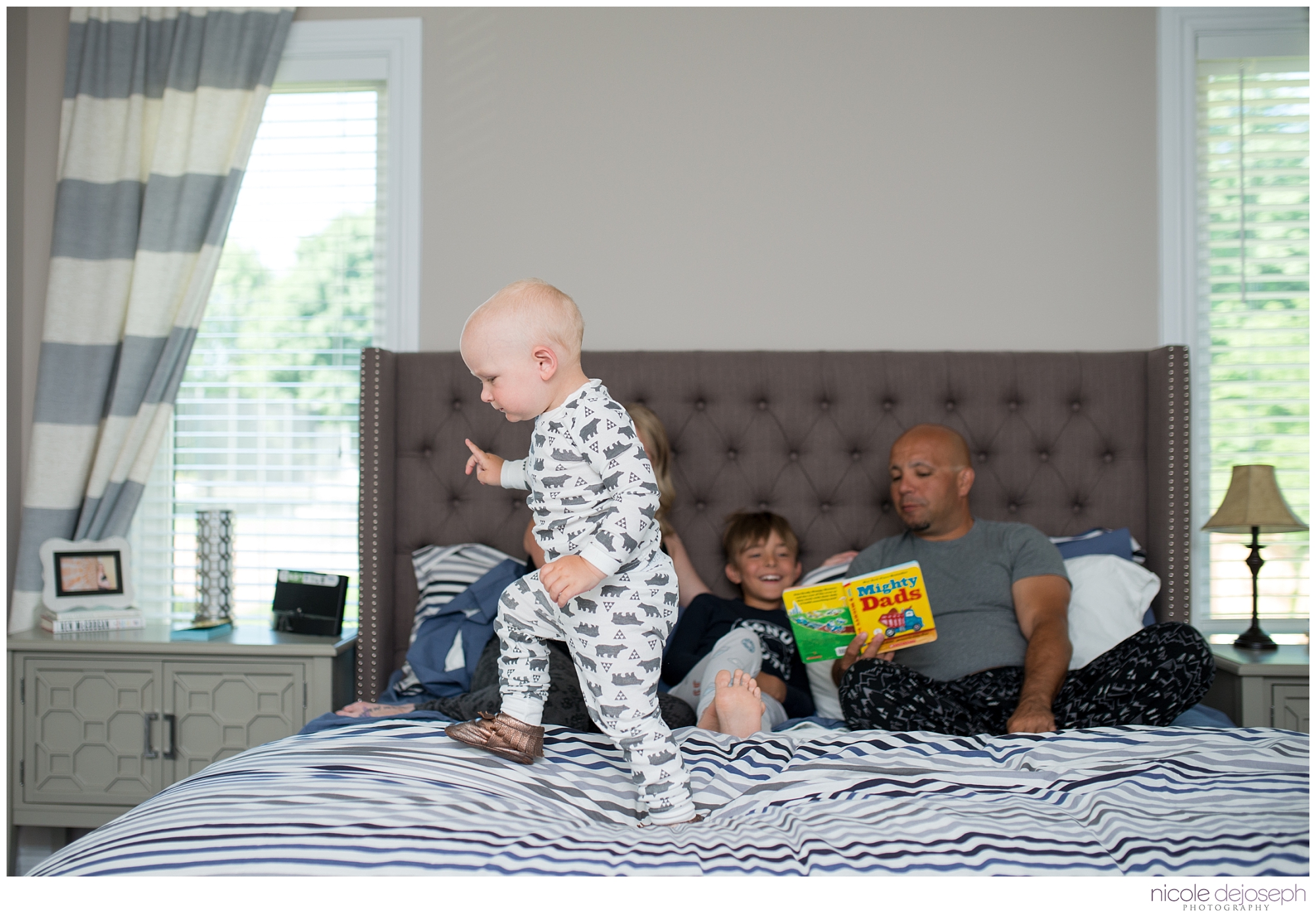Britanie and Grayson's quiet days together before the new babe arrives. In home lifestyle maternity photographer. Nicole DeJoseph Photography; Chatham, Ontario wedding and lifestyle photographer.