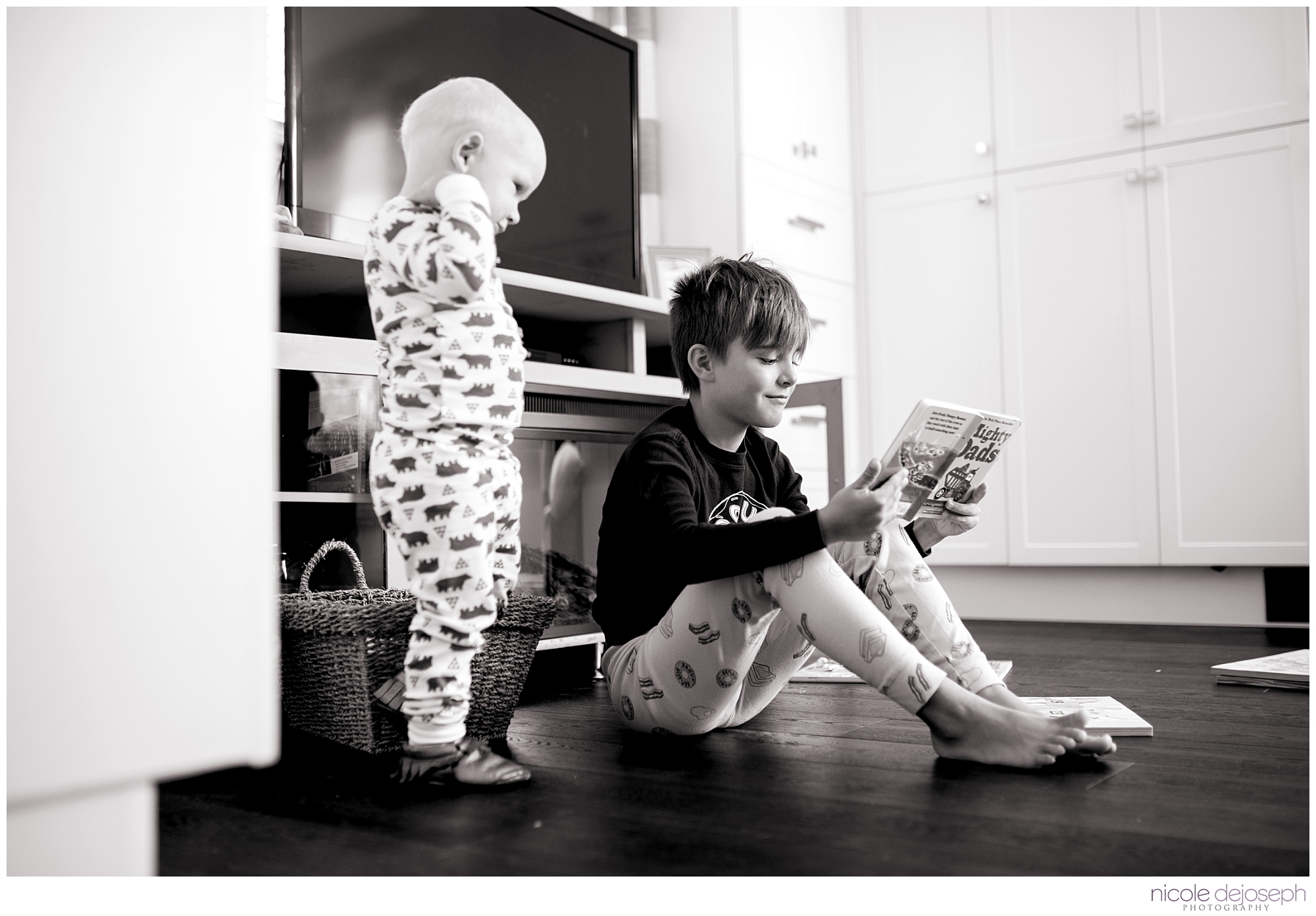 Britanie and Grayson's quiet days together before the new babe arrives. In home lifestyle maternity photographer. Nicole DeJoseph Photography; Chatham, Ontario wedding and lifestyle photographer.