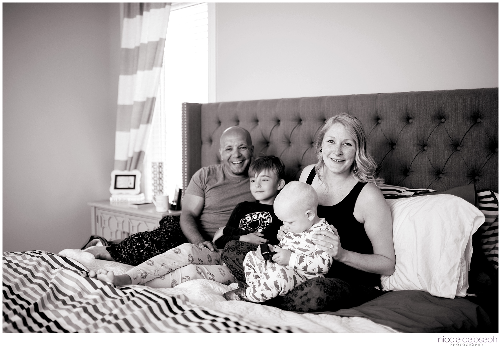 Britanie and Grayson's quiet days together before the new babe arrives. In home lifestyle maternity photographer. Nicole DeJoseph Photography; Chatham, Ontario wedding and lifestyle photographer.
