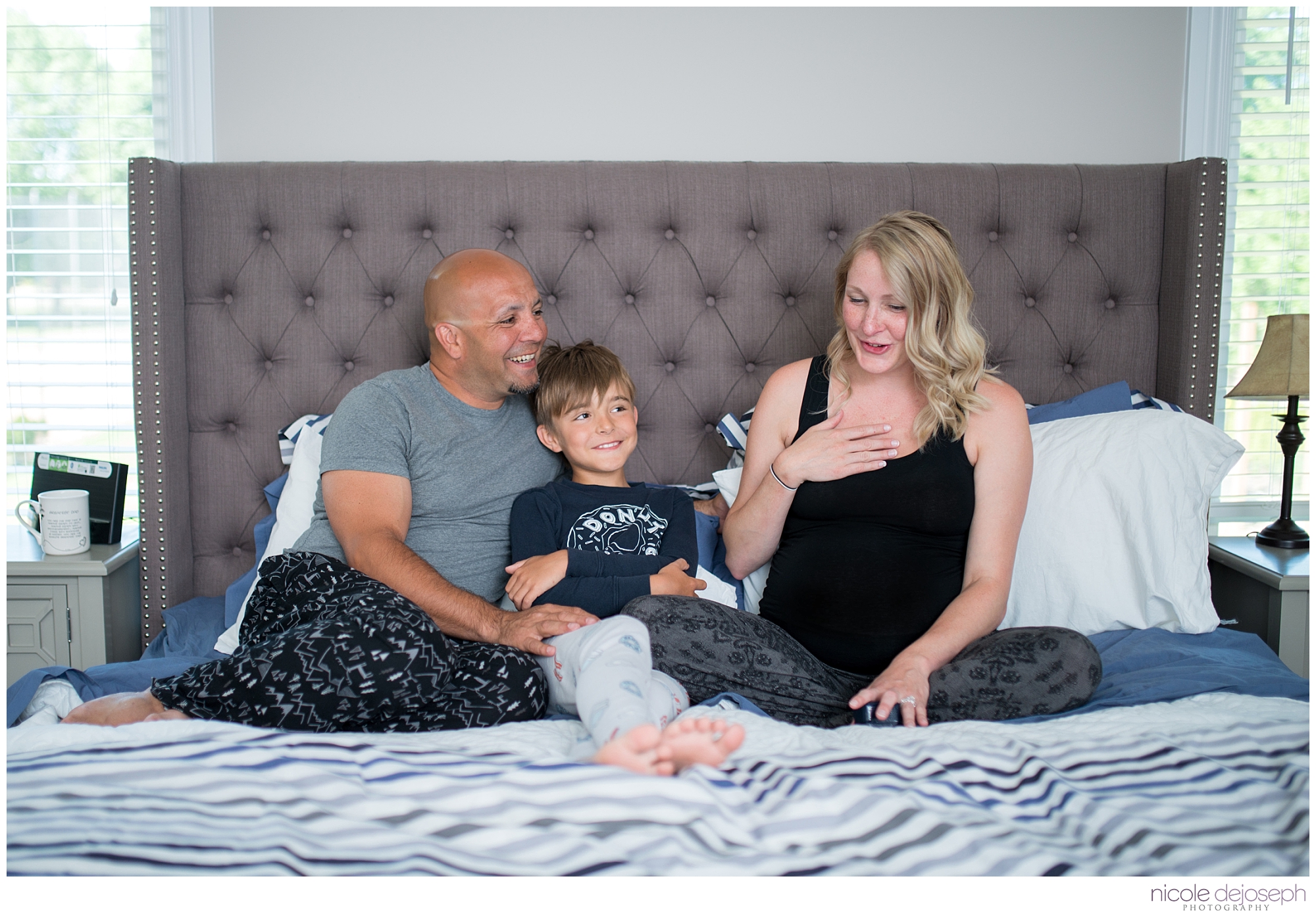 Britanie and Grayson's quiet days together before the new babe arrives. In home lifestyle maternity photographer. Nicole DeJoseph Photography; Chatham, Ontario wedding and lifestyle photographer.