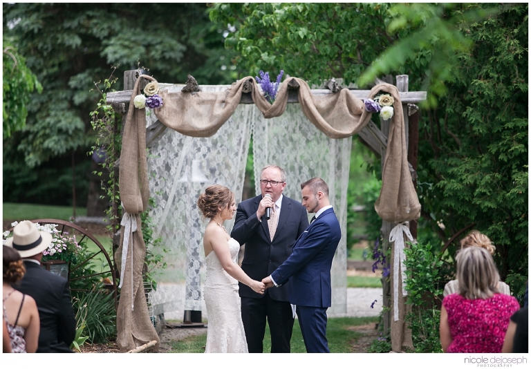 Lynette and Sean's country backyard wedding took place in Comber, Ontario at beautiful wedding venue Iron Kettle Bed and Breakfast. Photographed by Nicole DeJoseph Photography; Chatham, Ontario wedding photographer.