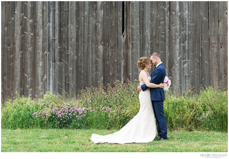 Lynette and Sean's country backyard wedding took place in Comber, Ontario at beautiful wedding venue Iron Kettle Bed and Breakfast. Photographed by Nicole DeJoseph Photography; Chatham, Ontario wedding photographer.